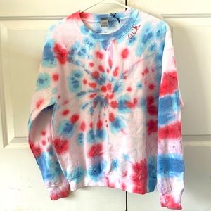 Yay sports clothing co. Tie dye of pinks, blues, and white.